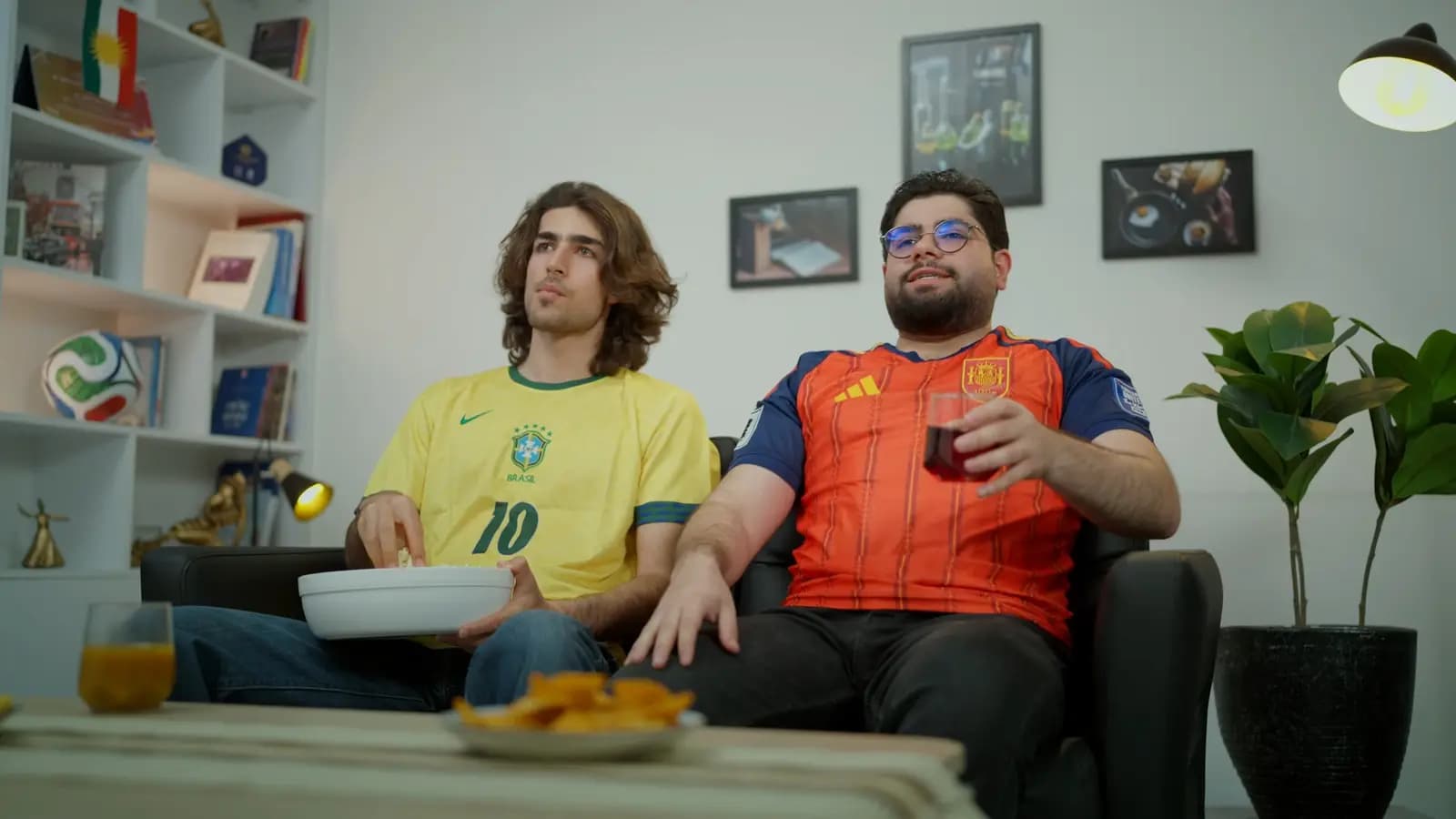 Two shirts, one sofa, one cool room.
