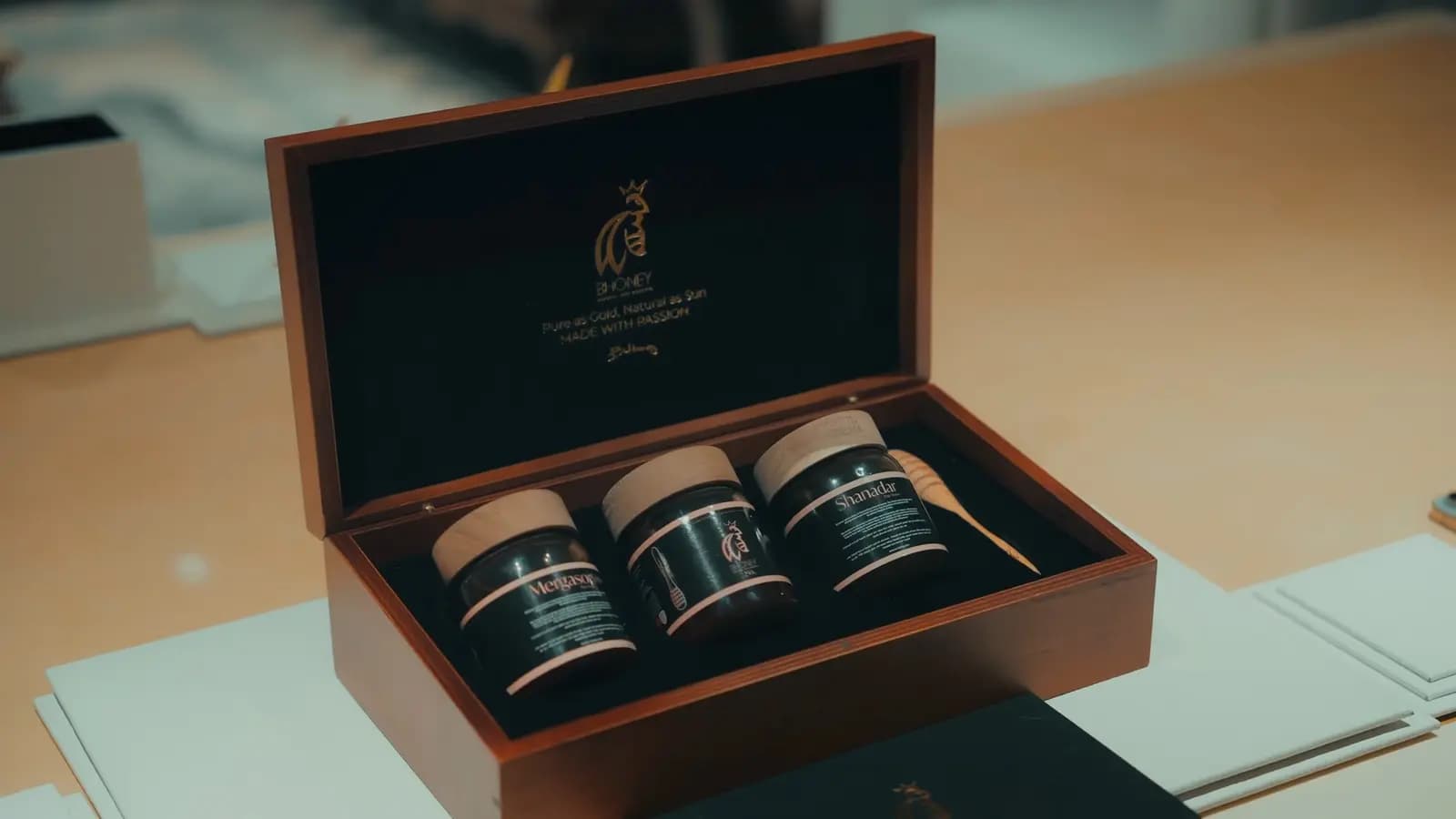 Opened: three jars, set in black.