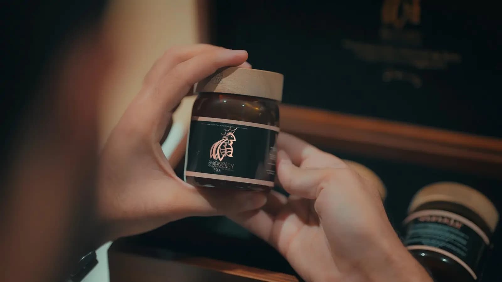 The jar in hand — the detail that makes it a gift.